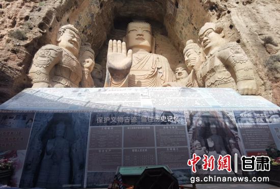 時下，中國“石窟鼻祖”天梯山石窟第13窟大佛足部與局部危巖體搶救性保護項目正在施工。圖為施工現(xiàn)場。陳曉斌 攝